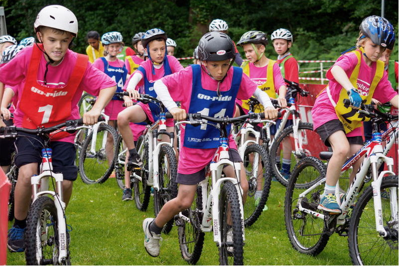 Charity fundraising with Greenham Trust - Image of kids riding bikes to show sport